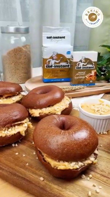 Chocolate bagels filled with peanut butter cream cheese